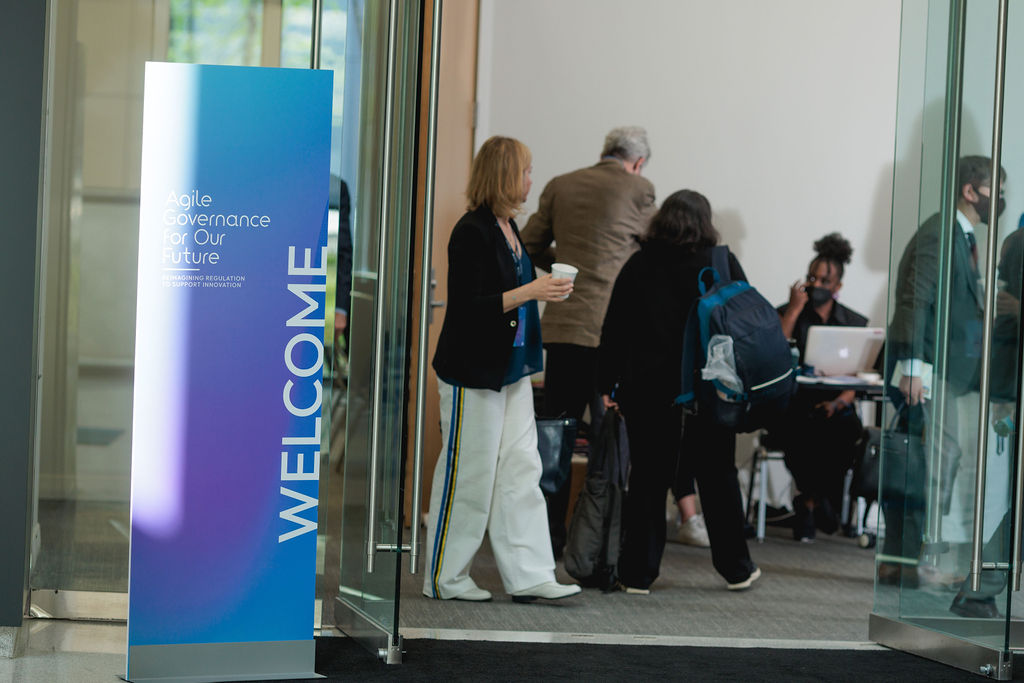 a welcome banner and guests arriving