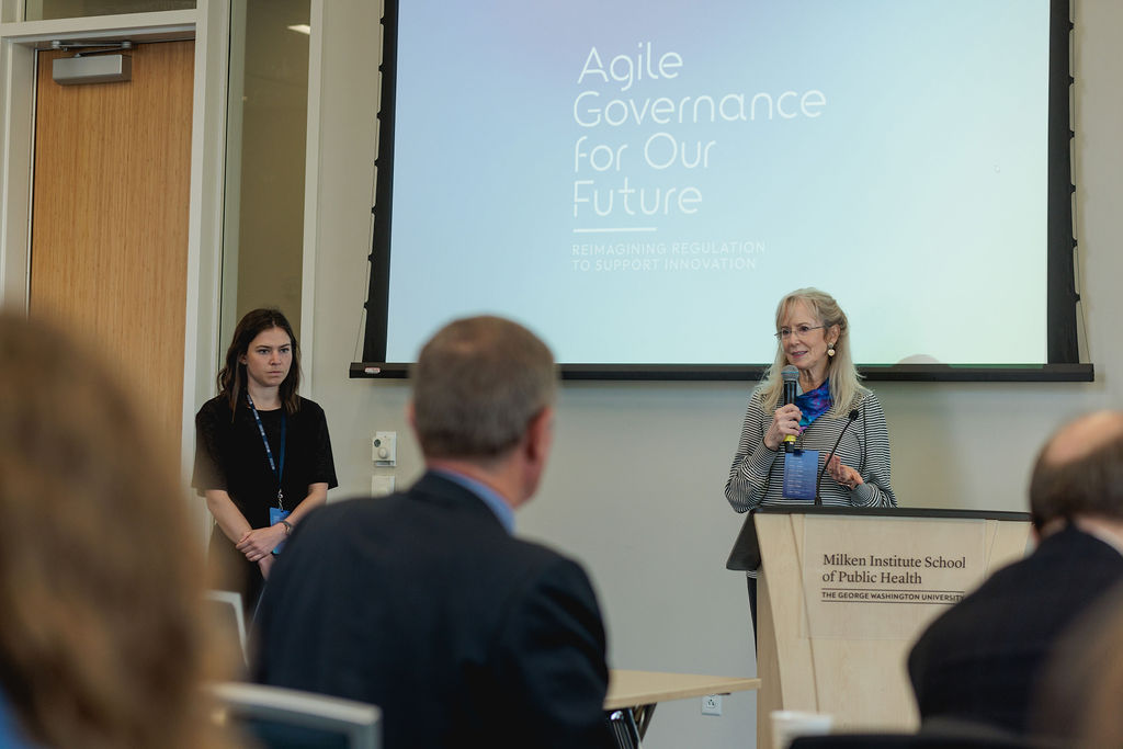 Susan Dudley speaking with a microphone