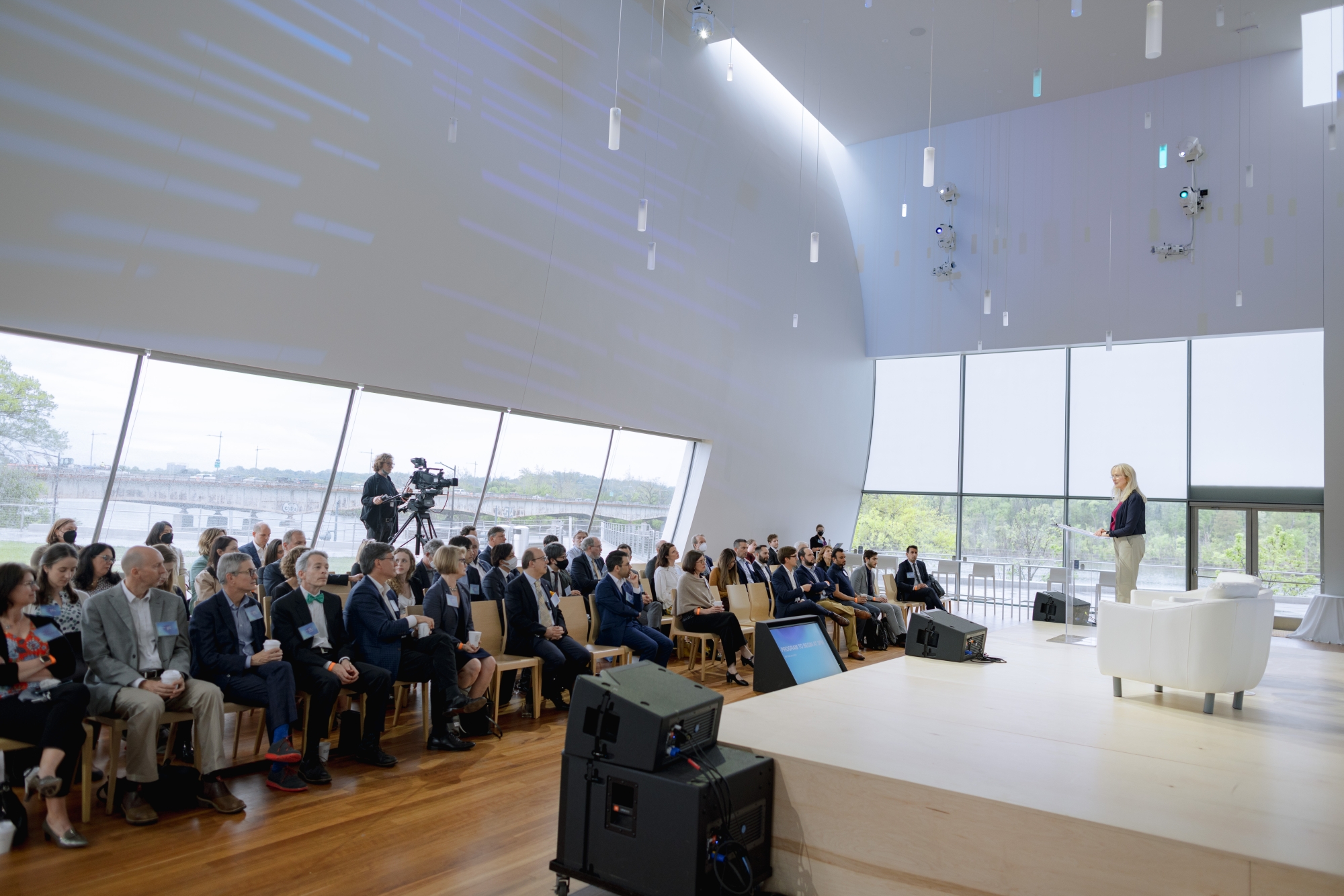Photo of Susan Dudley speaking on stage