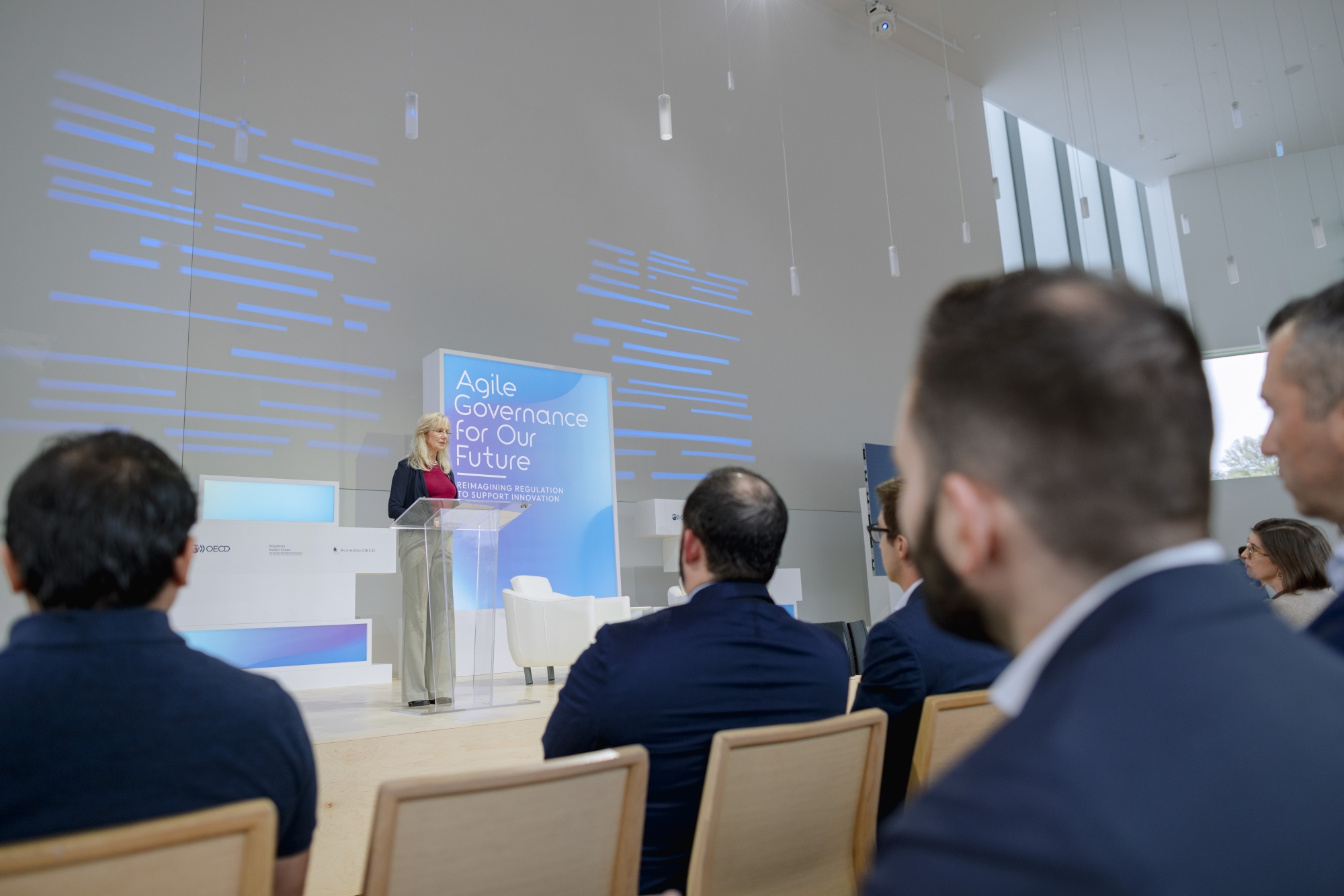Photo of Susan Dudley speaking on stage