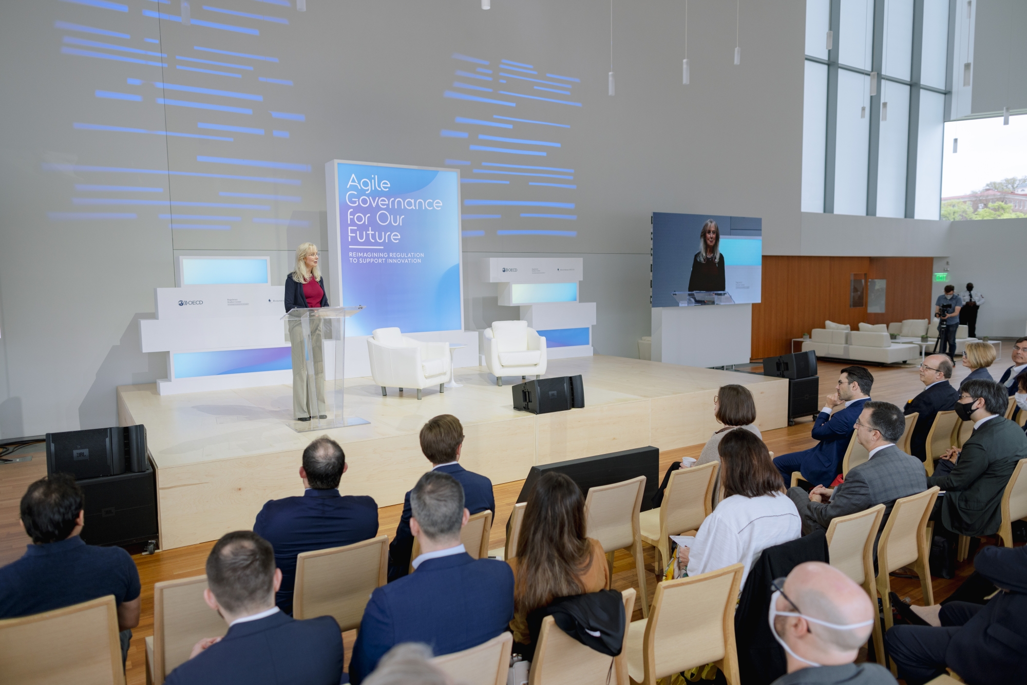 Photo of Susan Dudley speaking on stage