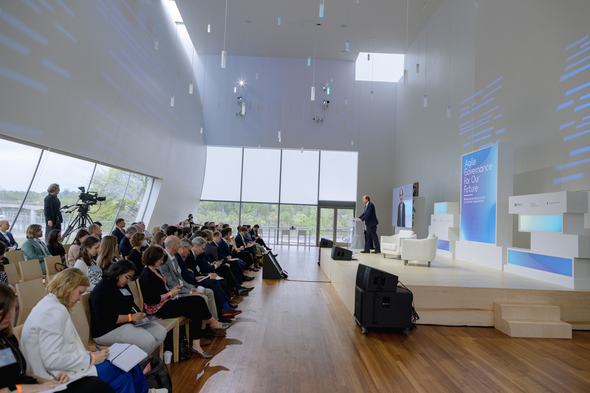 audience and stage as Cass Sunstein speaks
