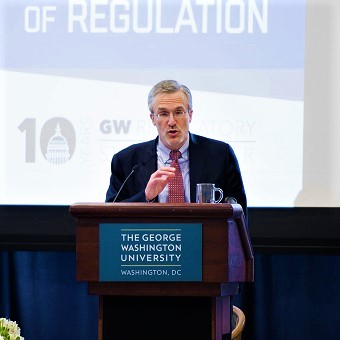 Cary Coglianese at podium