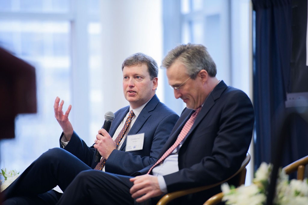 Christopher Carrigan sitting down next to Cary Coglianese