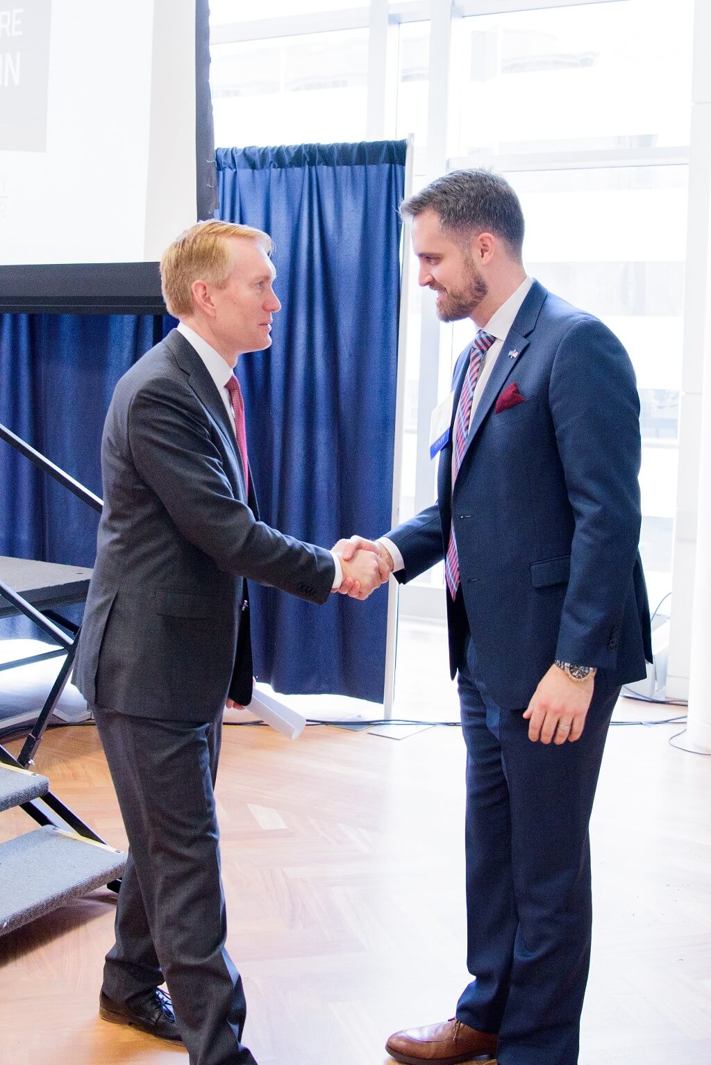 Bryce Chinault and Senator James Lankford shaking hands
