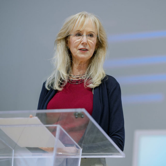 Susan E. Dudley speaking at podium