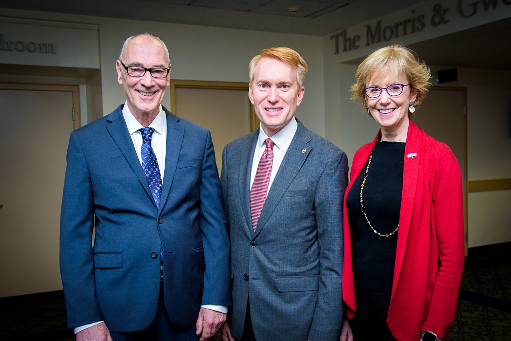 Robert Miller, Senator James Lankford, and Susan Dudley posing