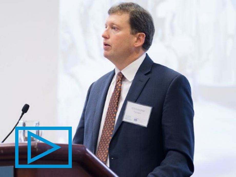 Photo of Christopher Carrigan speaking from a podium.