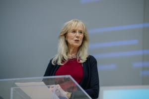 Photo of Susan Dudley speaking at a podium