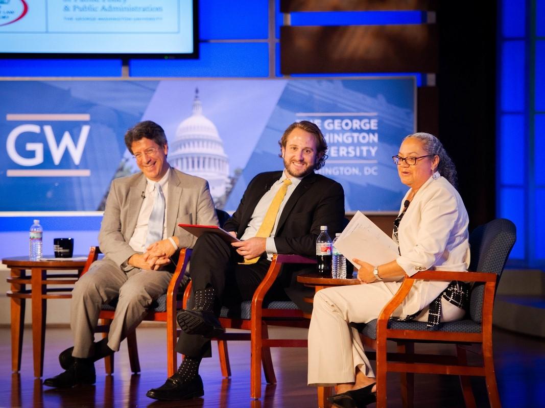 Panel Two participants on stage in the Jack Morton Auditorium.